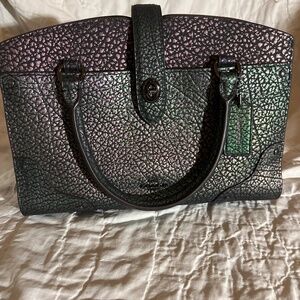 More pics of the iridescent Mercer 24 with shoulder strap